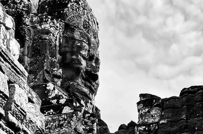 Siem Reap: Angkor Wat Sunrise or Sunset Guided Tour - Bayon Temple: large smiling faces and how to see them without rushing