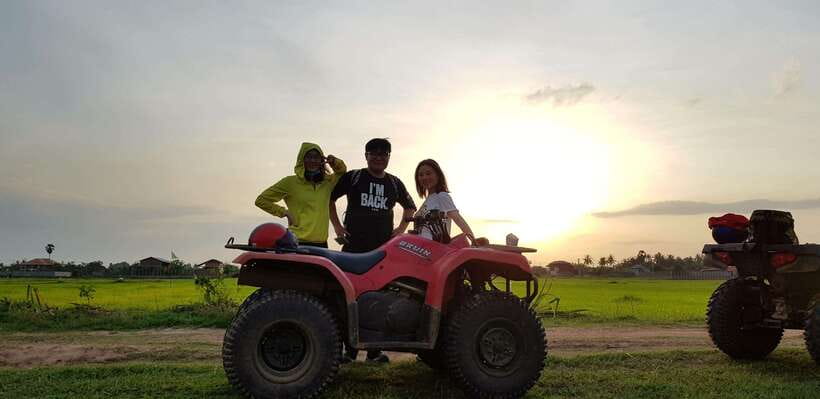 Siem Reap: Countryside Quad Bike Sunset Adventure - Mud, washing off, and the Cambodia traditional house drink moment