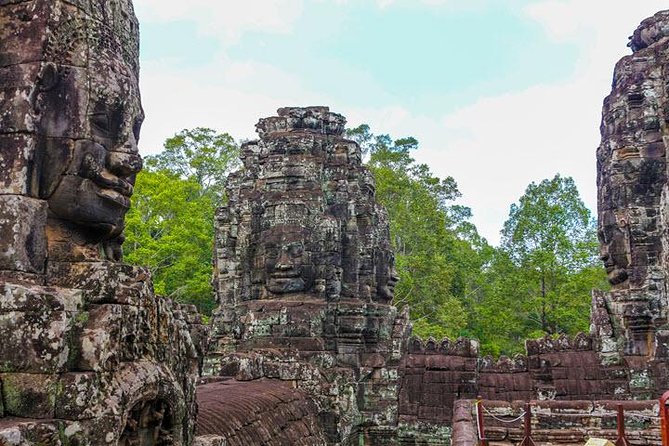Siem Reap Full Day Angkor Wat Tour Small Group - Ta Prohm: Tomb Raider vibes, with trees and roots doing the framing