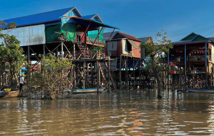 Siem Reap: Kampong Phluk Floating Village Tour with Boat - Kampong Phluk on foot: stilt homes, a mural church, and wet versus dry season life