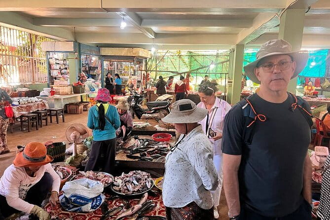 Siem Reap: Morning Bike Tours with Local Market & Lunch - Buddhist temple blessing: a calm, respectful pause