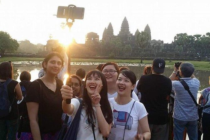Sunrise Tour of Angkor Temples from Siem Reap - Bayon Temple: compact, maze-like corridors, and the faces