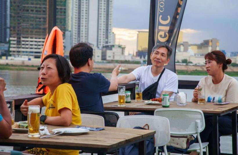Sunset Cruise Unlimited BBQ Buffet, Cold Beers, Soft Drinks<em> – Key things I’d circle before you book’ /></p>
<ul>
<li><strong>Gold option is the full meal deal</strong>: unlimited BBQ buffet plus unlimited cold beers and soft drinks</li>
<li><strong>You get real river scenery, not just waterfront walls</strong>: pass homes on stilts and see local fishing activity</li>
<li><strong>Sunset or lights, depending on timing</strong>: the skyline photo moment is the whole point</li>
<li><strong>Onboard service can make or break it</strong>: many people praise attentive crew and quick drink refills</li>
<li><strong>Plan your return</strong>: hotel drop-off is not included, so decide where you want to go after</li>
</ul>
<h2 id="mekong-magic-on-the-water-what-this-sunset-cruise-is-like">Mekong Magic on the Water: What This Sunset Cruise Is Like</h2>
<p><img width="820" height="615" decoding="async" src=