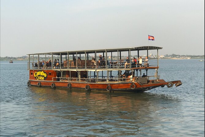 Sunset & Evening Dinner Cruise With One Way Free Pick Up - Phnom Penh at sunset, from the Mekong and Tonle Sap
