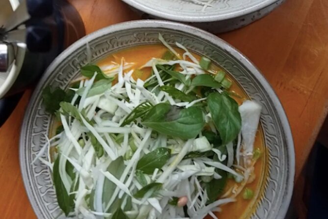 Ultimate Phnom Penh Food Tour by Tuk Tuk: 20 Tastings and Drinks - Independence Monument dessert stop, then Bassac Lane cocktail or mocktail